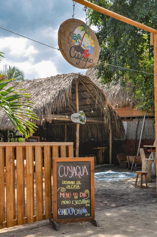 Hostal Cuyagua ปาโลมิโน ภายนอก รูปภาพ